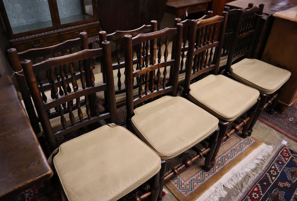 A set of eight 19th century ash rush-seat chairs